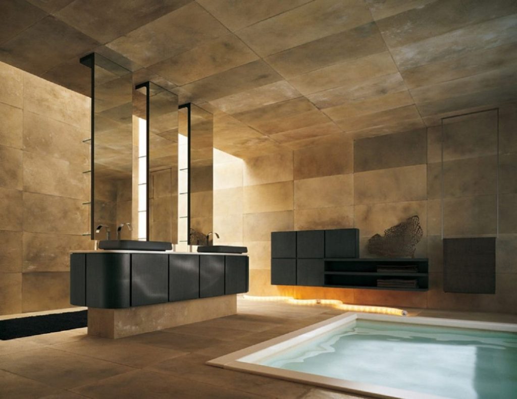 Minimalist bathroom with double sinks, large mirrors, and a built-in pool