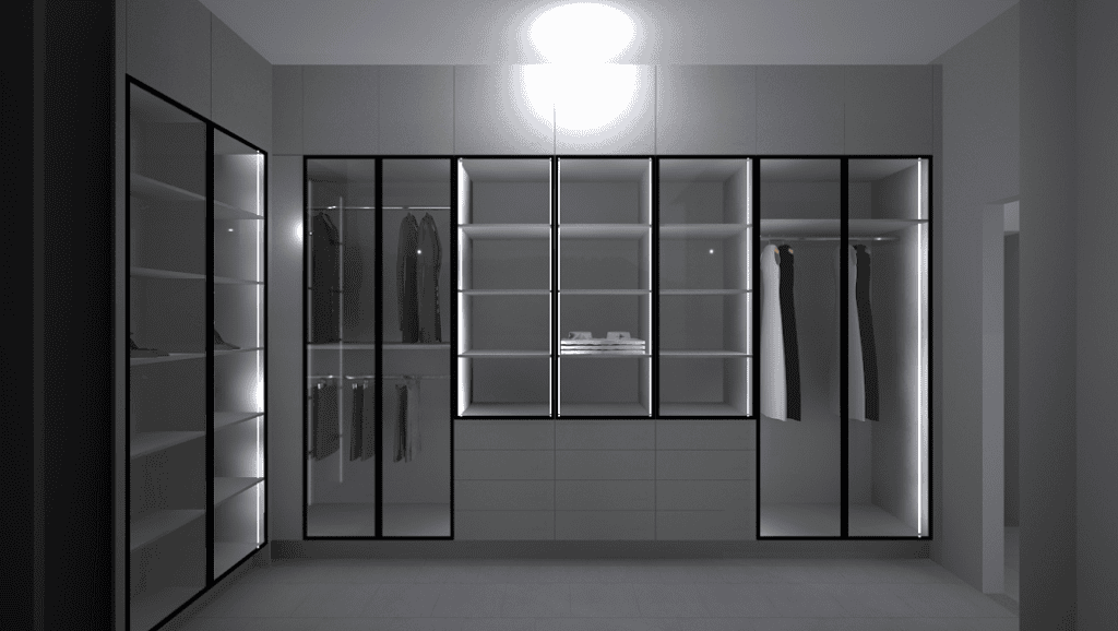 Large fitted bedroom cupboards with glass doors and interior lighting