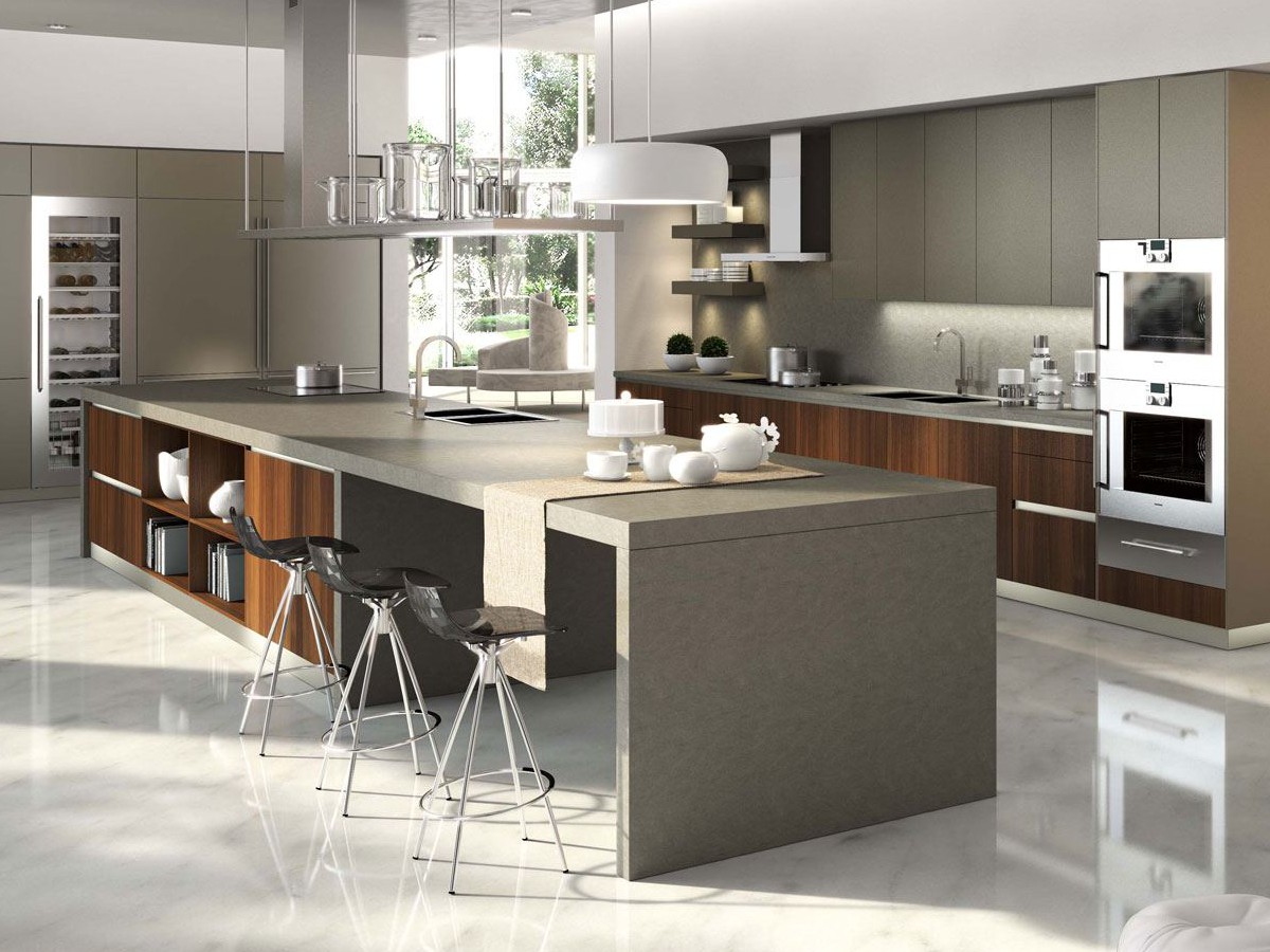 Luxury modern kitchen with matt grey cupboards, a large island with breakfast seating, integrated appliances and polished marble floors.