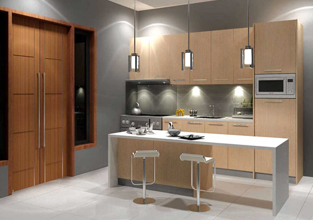 Modern small kitchen with light wood cabinets, white island, two stools, pendant lights, and grey walls.