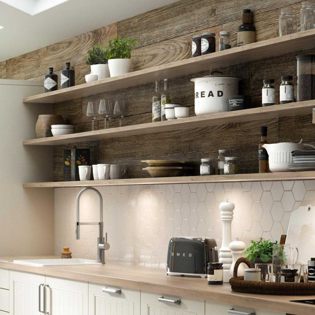 Modern kitchen with light wood open shelves, white hexagonal tile backsplash, stainless steel faucet, black SMEG toaster, and