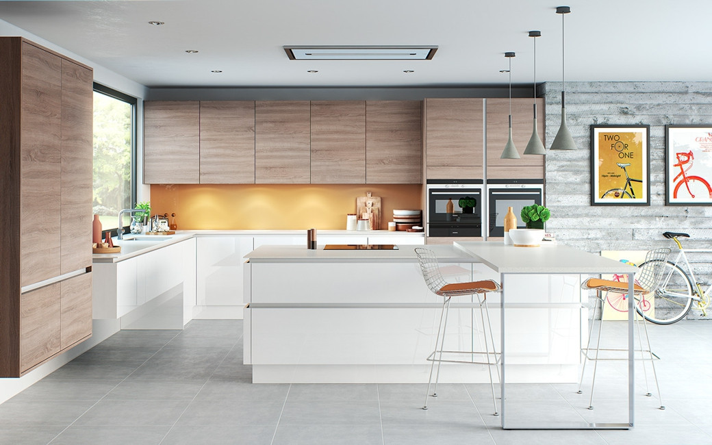 Modern kitchen with white and wood cabinetry, a large island, pendant lights, bar stools, and bike decor against a concrete w