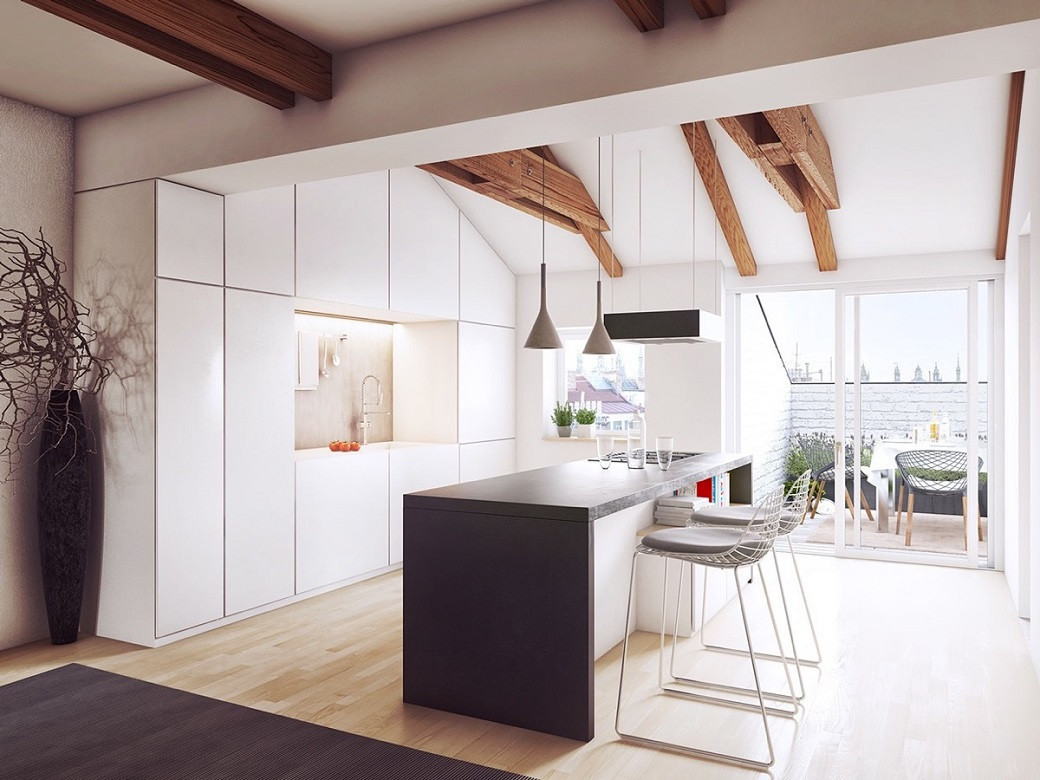 Modern kitchen with a rectangular island in black and white, wooden ceiling beams, pendant lights, and sliding glass doors to