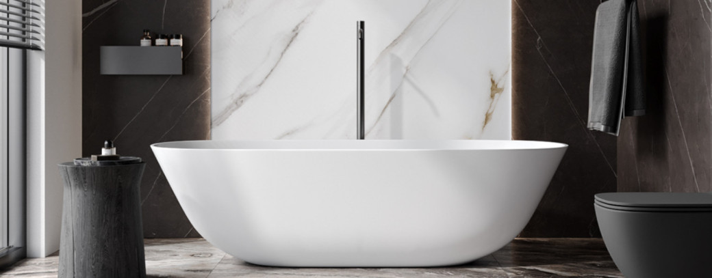 Modern bathroom with a freestanding white bathtub, dark marble walls, and a black toilet with a towel hanging nearby.
