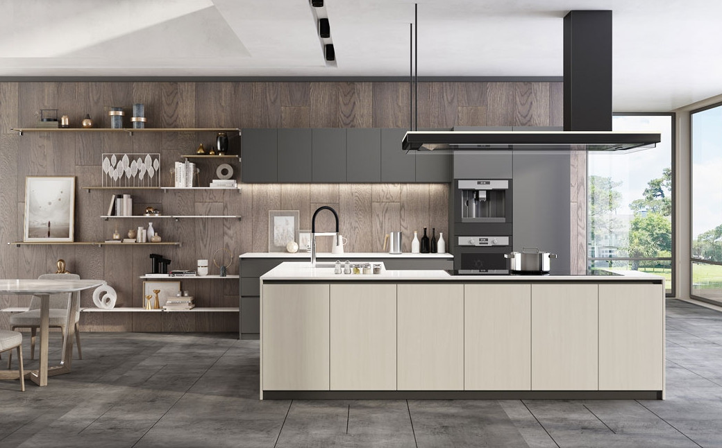 Modern handleless kitchen with light wood island, dark grey cabinets, open shelving, and large windows overlooking greenery.